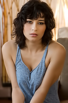 Raven Rockette pulls off her soft top and jeans