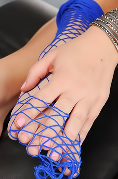Bustybabe On Fishnet Stockings